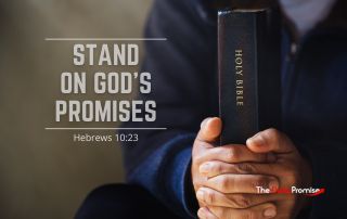 A man is holding a closed Bible - "Stand on God's Promises" - Hebrews 10:23