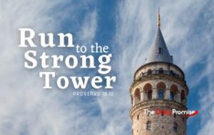 The tower of a castle against a blue sky with whispery white clouds. "Run to the Strong Tower." - Proverbs 18:10