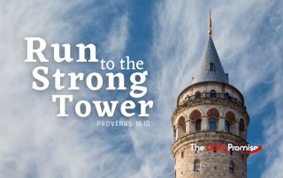 The tower of a castle against a blue sky with whispery white clouds. "Run to the Strong Tower." - Proverbs 18:10