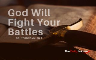 A long sword, resting on a table. You can only see the handle and part of the blade. "God Will Fight Your Battles" - Deuteronomy 20:4